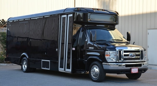 A picture of a black party bus.